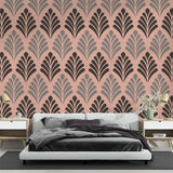 Art deco pink and black fan pattern wallpaper in a modern dining room with crystal chandelier and velvet chairs