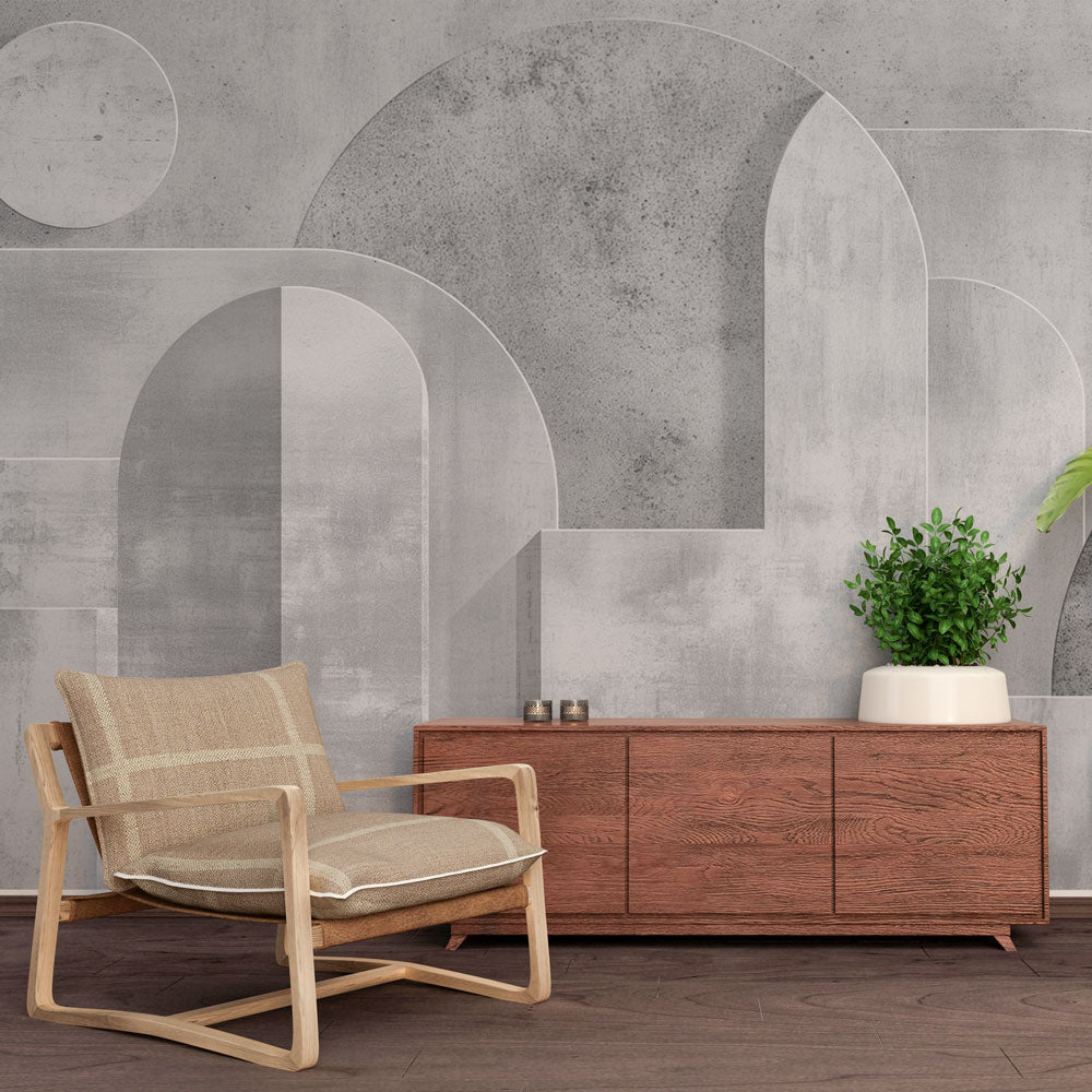 Modern Art Deco geometric wallpaper with arches and circles creating depth in a minimalist living room setting