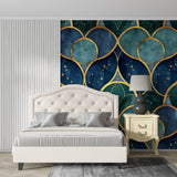 Blue and gold art deco wallpaper creating drama in master bedroom