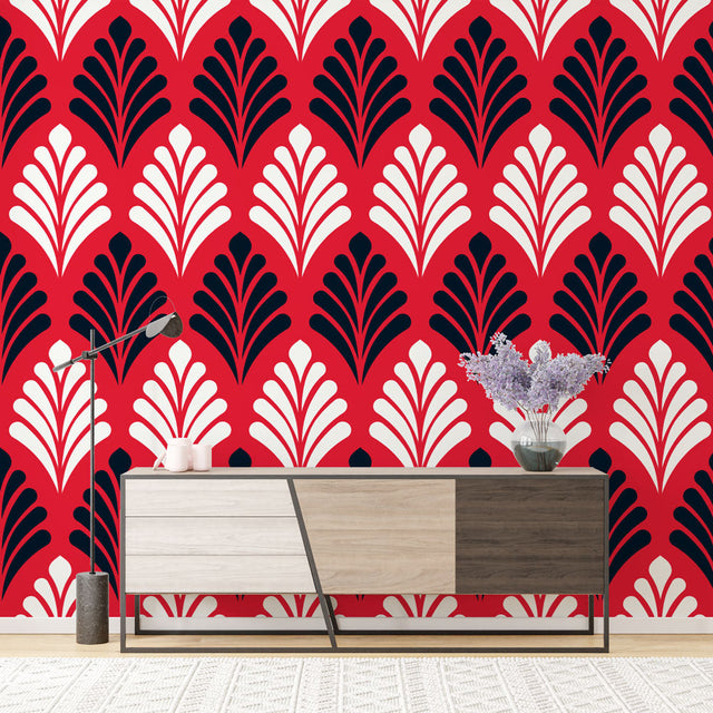Art deco fan pattern wallpaper in red and black creating drama in a modern dining room with pendant lights