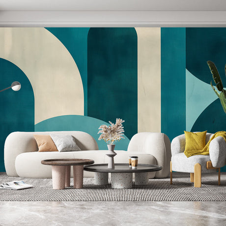 Art deco geometric wallpaper with teal arches creating depth in a modern living room with minimal furniture