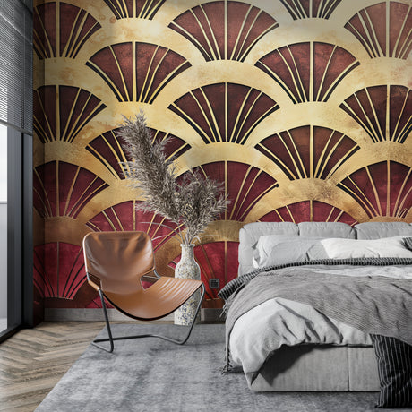 Art deco fan pattern wallpaper in a modern dining room with gold and burgundy details catching evening light