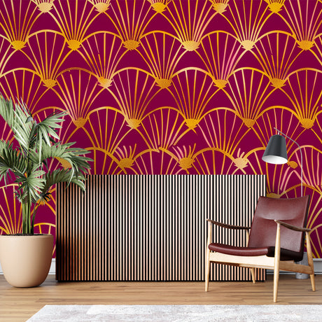 Art Deco fan pattern wallpaper in burgundy and gold creating drama in a modern dining room