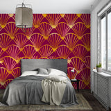 Art Deco burgundy wallpaper with gold fans making statement in living room