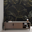 Luxury Art Deco Ginkgo wallpaper in modern dining room with gold accents and black furniture