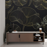 Luxury Art Deco Ginkgo wallpaper in modern dining room with gold accents and black furniture