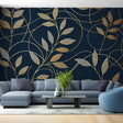Navy and gold Art Deco wallpaper bringing elegance to a modern living room with soft lighting highlighting the metallic details