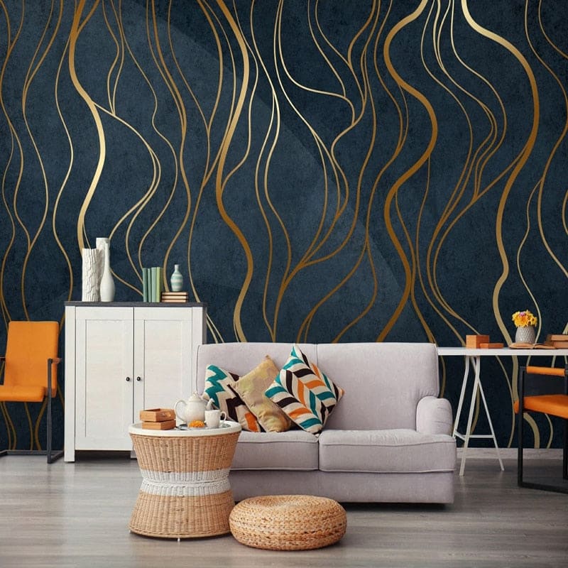 Gold art deco wallpaper creating luxury atmosphere in master bedroom with brass details