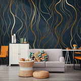 Gold art deco wallpaper creating luxury atmosphere in master bedroom with brass details
