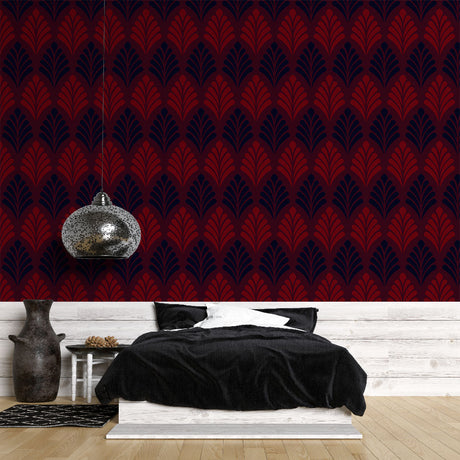 Red Art Deco feather pattern wallpaper creating drama in a modern dining room with crystal chandelier