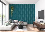 Teal geometric wallpaper adding luxury to powder room with gold fixtures