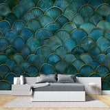Teal art deco wallpaper with gold trim in master bedroom with white bedding