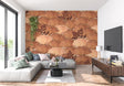 Art deco fan leaf wallpaper in modern living room with grey sofa and natural light