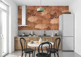 Botanical fan pattern mural in home office with desk and plants
