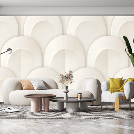 White geometric arch pattern wallpaper in a bright modern living room with high ceilings and minimal furniture