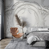 Master bedroom accent wall with white Art Nouveau relief pattern creating depth