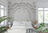 Hallway showcase of 3D white relief wallpaper with dramatic side lighting