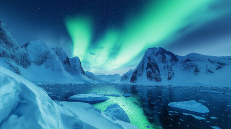 Northern Lights wallpaper design file showing ethereal green aurora over snow-capped mountains