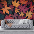 Autumn leaves wallpaper mural creating a cozy atmosphere in a modern living room with soft lighting