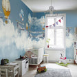 Aviation wallpaper mural with hot air balloons in modern nursery, creating a dreamy atmosphere