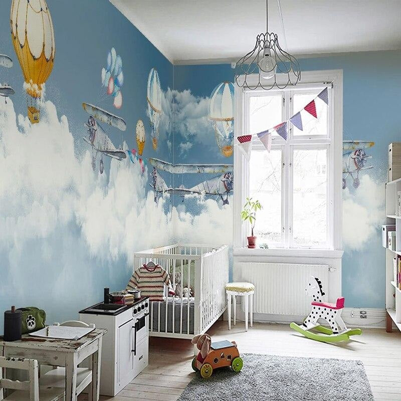 Aviation wallpaper mural with hot air balloons in modern nursery, creating a dreamy atmosphere