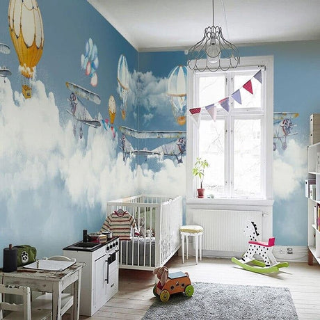 Aviation wallpaper mural with hot air balloons in modern nursery, creating a dreamy atmosphere