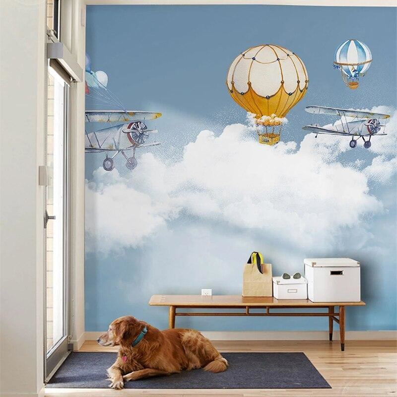 Baby room with vintage airplane wallpaper design creating gentle, calming atmosphere