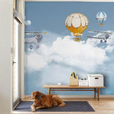 Baby room with vintage airplane wallpaper design creating gentle, calming atmosphere