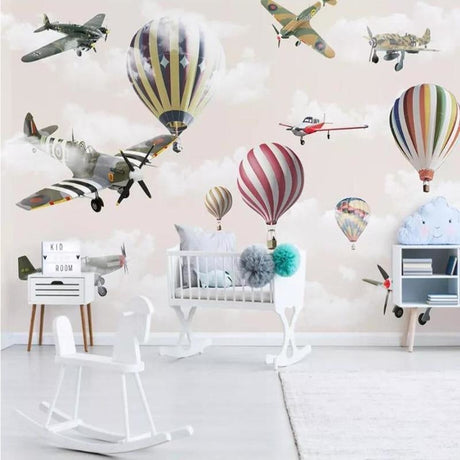 Aviation wallpaper mural styled in modern nursery with vintage planes and hot air balloons creating a dreamy atmosphere