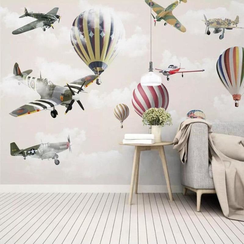 Vintage airplane wallpaper featuring hot air balloons displayed in playful kids bedroom with neutral furniture