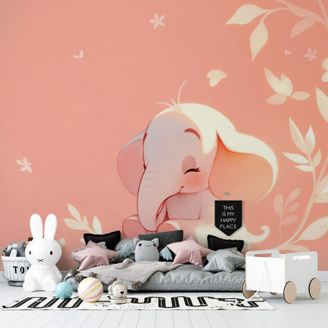 Pink baby elephant wallpaper beautifully styled in a modern nursery with white furniture and soft textiles