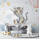 Hot air balloon wallpaper detail in a dreamy children's space with soft lighting