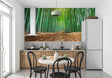 Bamboo forest wallpaper creating a peaceful atmosphere in a modern living room with natural light