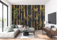 Black and gold bamboo wallpaper creating drama in a modern dining room with pendant lights