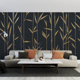 Black and gold bamboo wallpaper creating dramatic impact in modern dining room with pendant lighting