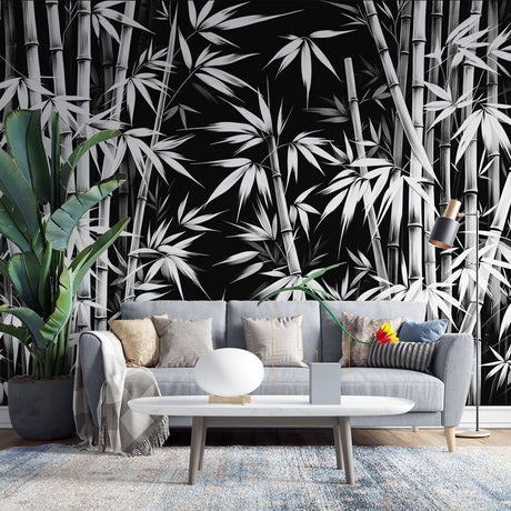 Black and white bamboo forest wallpaper creating depth in a modern minimalist living room with clean lines and natural light