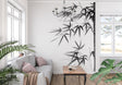 Black and white bamboo wallpaper in modern minimalist living room with natural light
