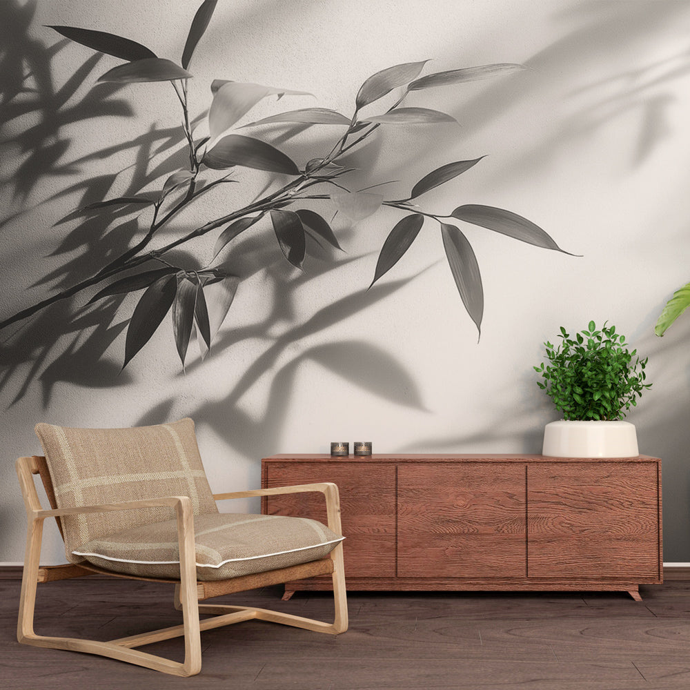 Black and white bamboo shadow wallpaper creating a zen atmosphere in a modern minimalist living room