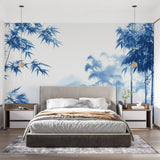 Blue Japanese bamboo wallpaper creating a serene atmosphere in a minimalist living room with natural light