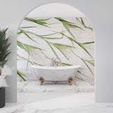 Bamboo leaf wallpaper creating a zen atmosphere in a modern living room with white furniture