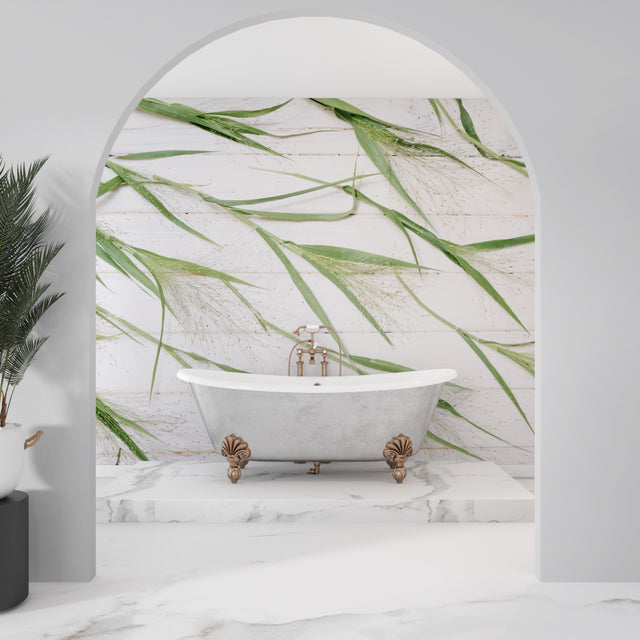 Bamboo leaf wallpaper creating a zen atmosphere in a modern living room with white furniture