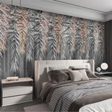 Rose gold bamboo leaf wallpaper creating a luxurious atmosphere in a modern living room with gray furniture