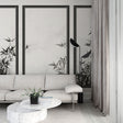 Japanese bamboo wallpaper mural creating a zen atmosphere in a modern living room with minimal furniture