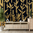 Bamboo mural wallpaper with gold art deco pattern creating depth in a modern dining room with ambient lighting