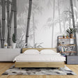Bamboo forest wallpaper creating a serene atmosphere in a modern minimalist living room with clean lines