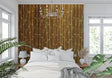 Bamboo wall mural creating zen atmosphere in modern living room with minimal furniture
