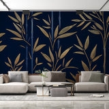 Navy and gold bamboo wallpaper creating an elegant atmosphere in a modern dining room with soft lighting