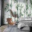 Bamboo wallpaper mural creating a zen atmosphere in a modern living room with natural light and minimal furniture