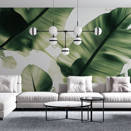 Tropical banana leaf wallpaper creating a stunning feature wall in a modern living room with natural light