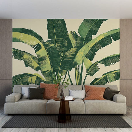 Tropical banana leaf wallpaper creating a stunning focal point in a modern living room with natural light